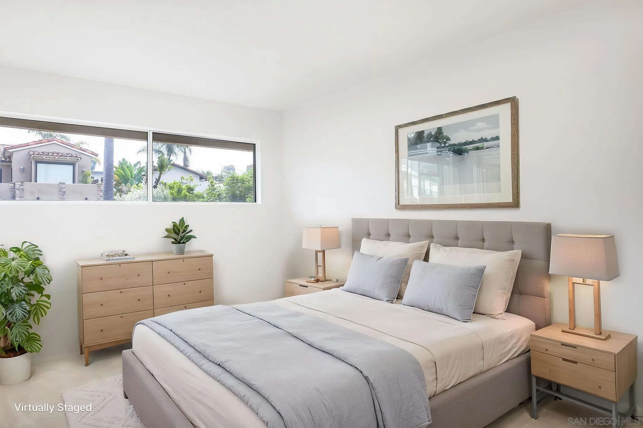 13933 Recuerdo Drive Del Mar, CA 92014 - Photo 31 of 44 a bedroom with a bed and a table