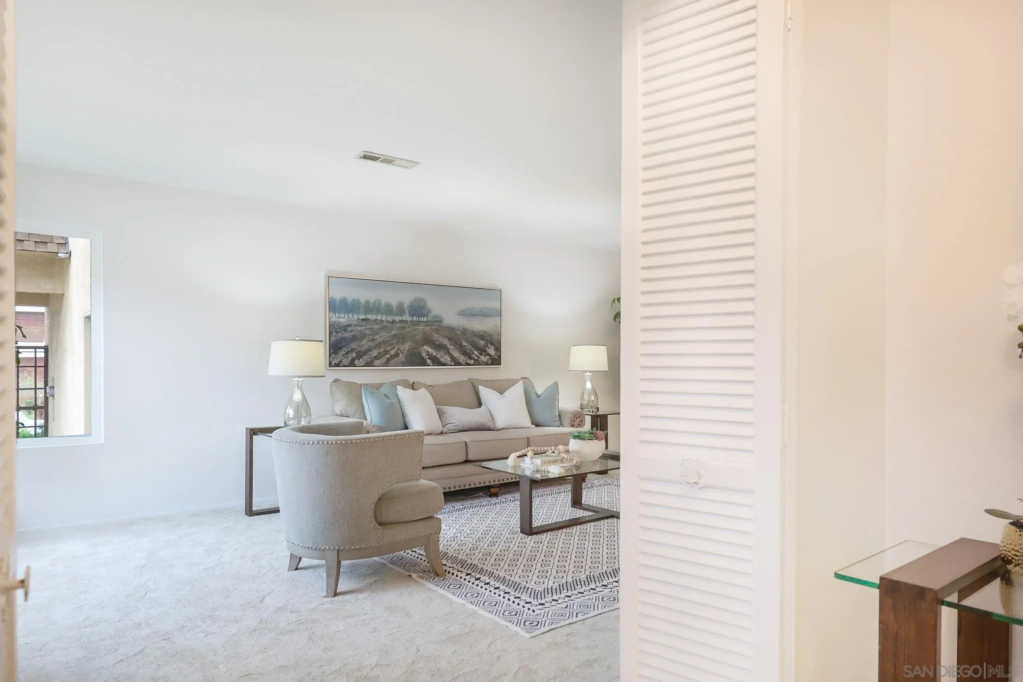 13933 Recuerdo Drive Del Mar, CA 92014 - Photo 6 of 44 a living room with furniture and a window