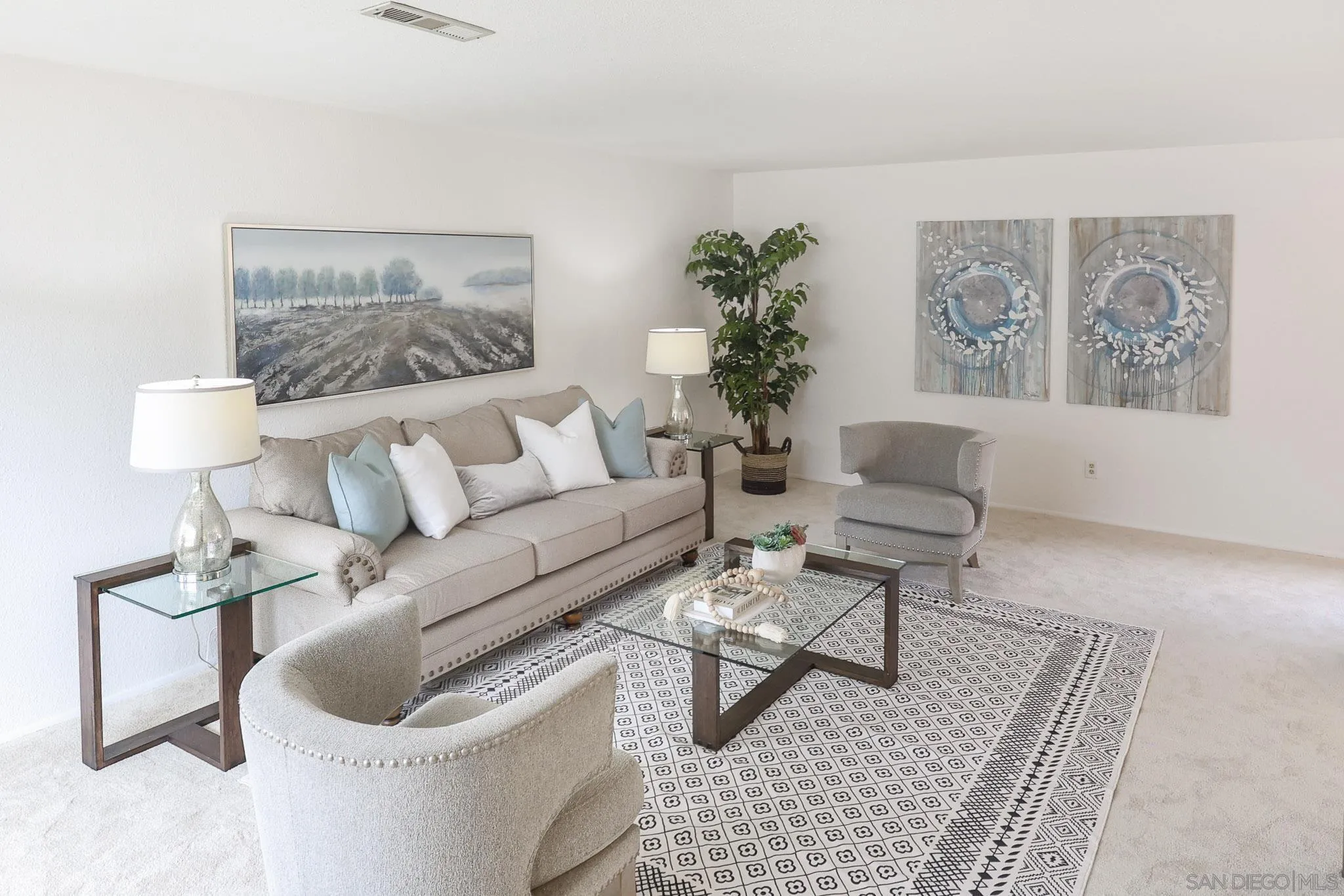 13933 Recuerdo Drive Del Mar, CA 92014 - Photo 7 of 44 a living room with furniture and a potted plant