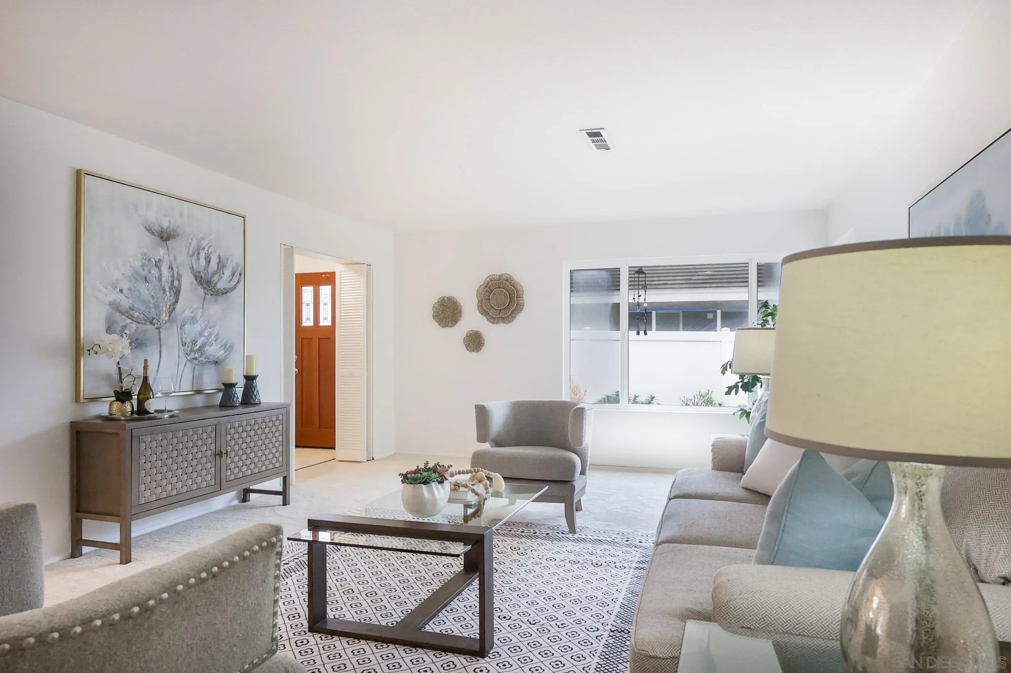 13933 Recuerdo Drive Del Mar, CA 92014 - Photo 8 of 44 a living room with furniture and a window