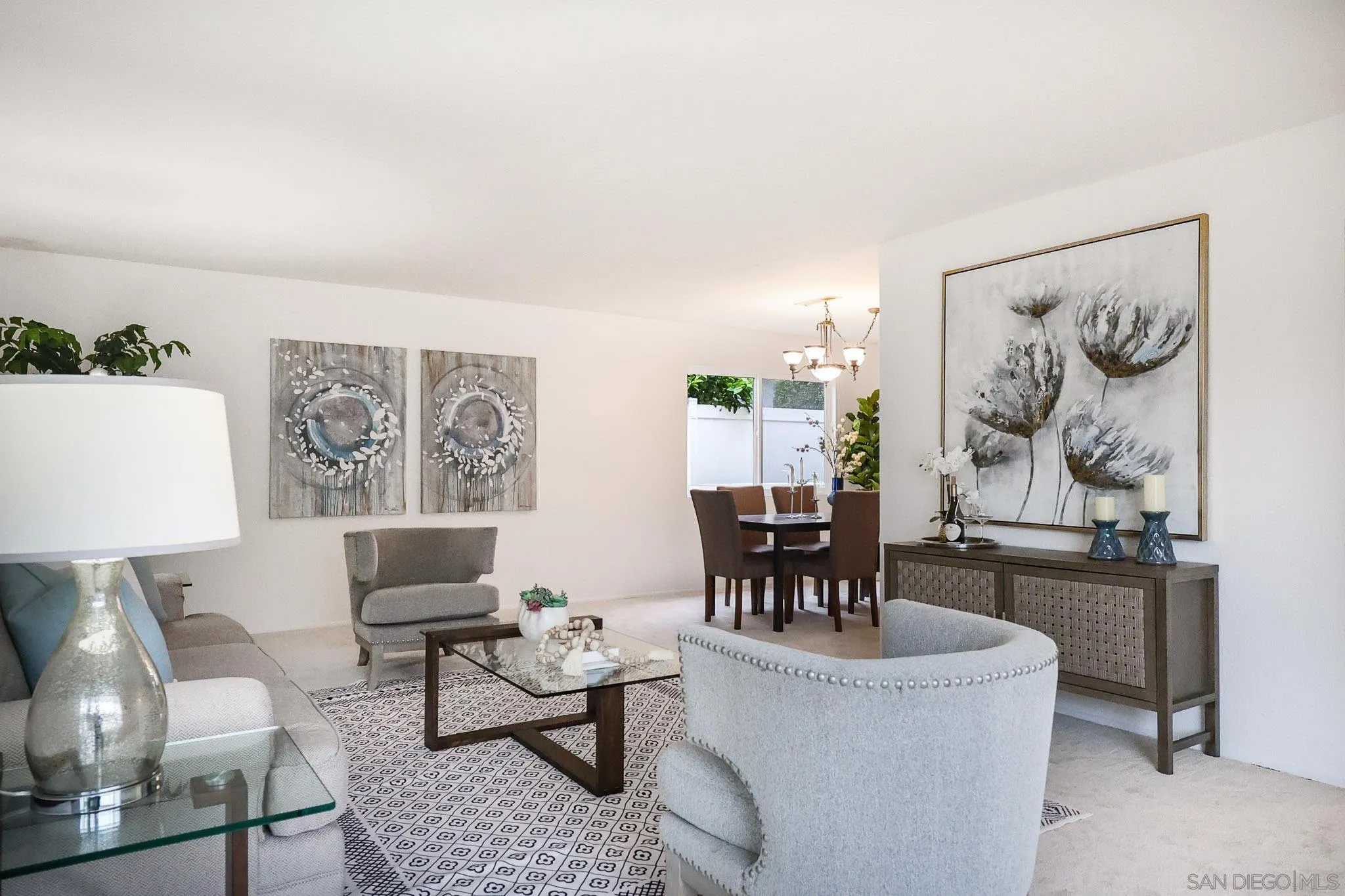 13933 Recuerdo Drive Del Mar, CA 92014 - Photo 9 of 44 a living room with furniture and a painting on the wall