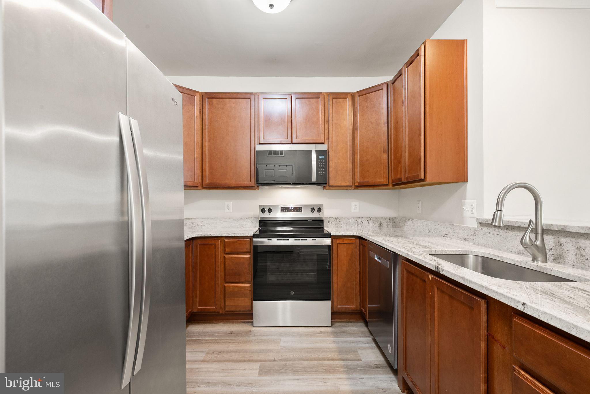 20610 Hope Spring Terrace, Unit 104 Ashburn, VA 20147 - Photo 6 of 38 Modern Kitchen
