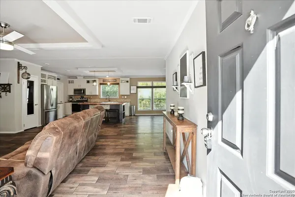 a living room with furniture and a table