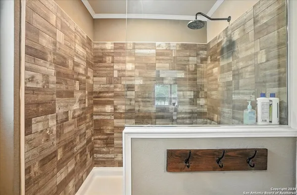 a bathroom with a sink and a shower