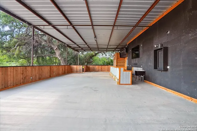 a view of a room with wooden walls