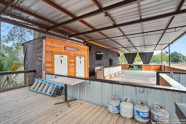 a view of a chairs and table on the wooden floor