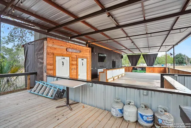 a view of a chairs and table on the wooden floor