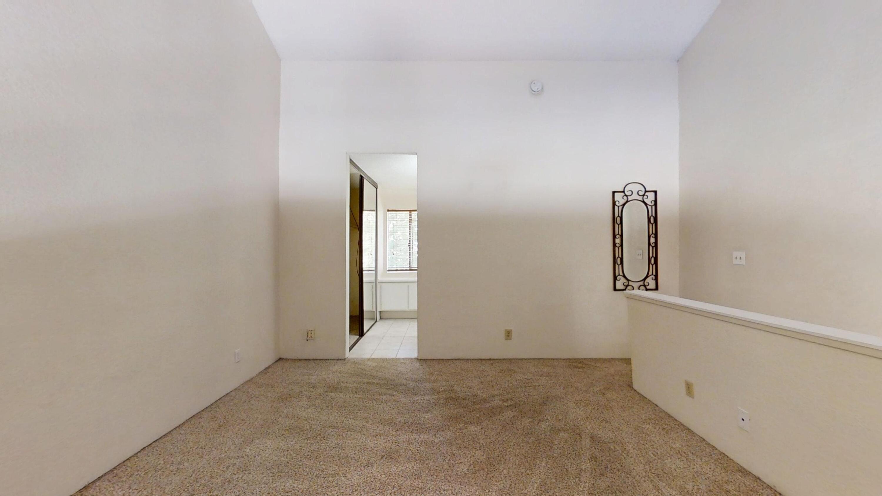 48255 Monroe Street, Unit 2 Indio, CA 92201 - Photo 18 of 35 an empty room with windows