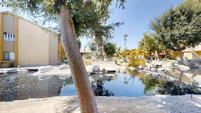 a view of swimming pool from a outdoor space
