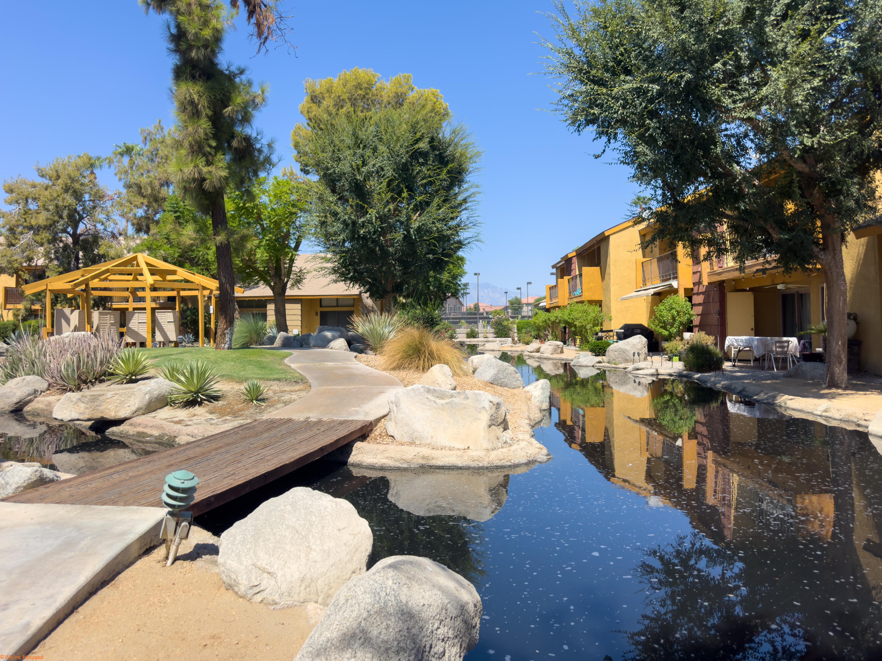 48255 Monroe Street, Unit 2 Indio, CA 92201 - Photo 33 of 35 a view of a patio and fire pit