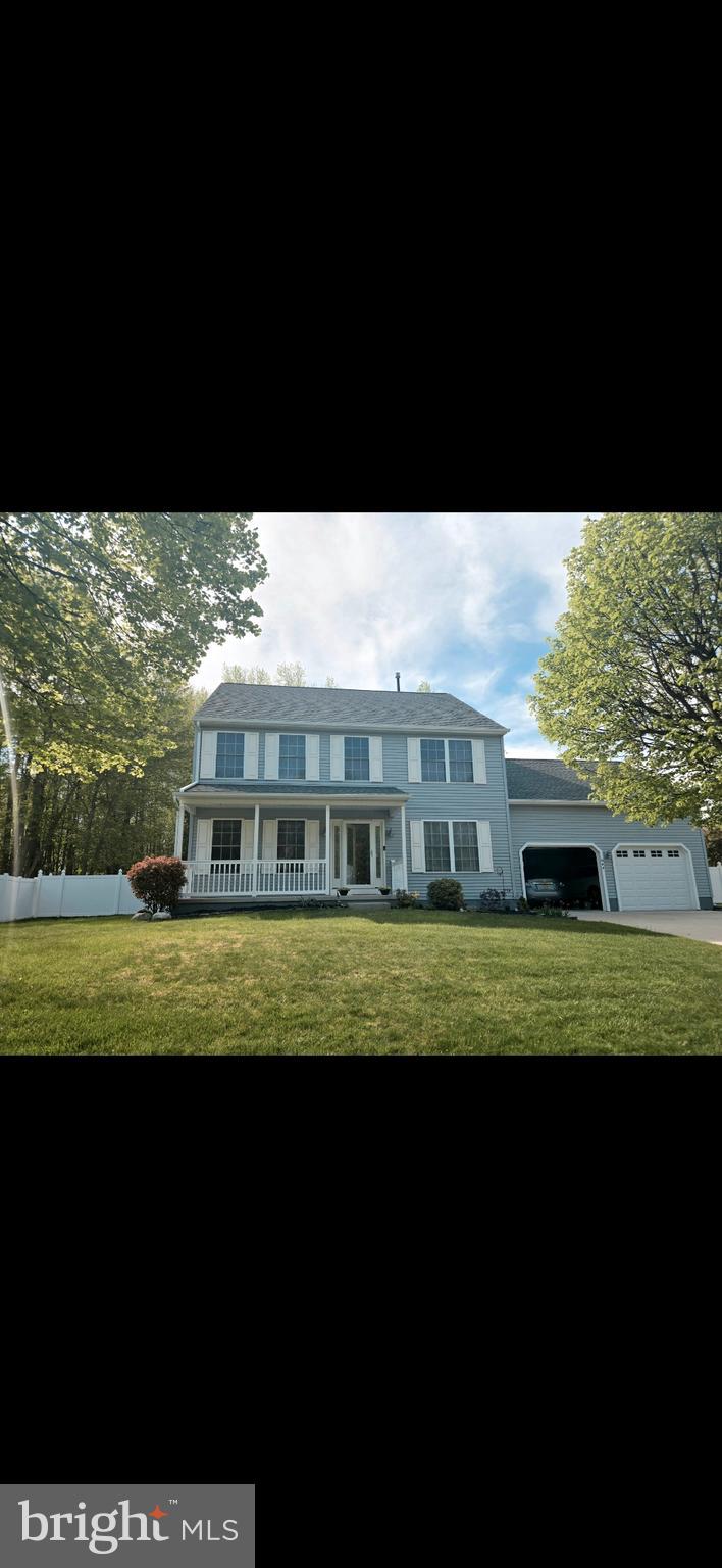 644 Surrey Road Sewell, NJ 08080 - Photo 14 of 37 a front view of a house with a yard