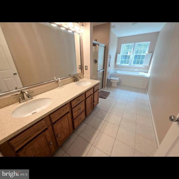 644 Surrey Road Sewell, NJ 08080 - Photo 18 of 37 a bathroom with a sink double vanity and a mirror