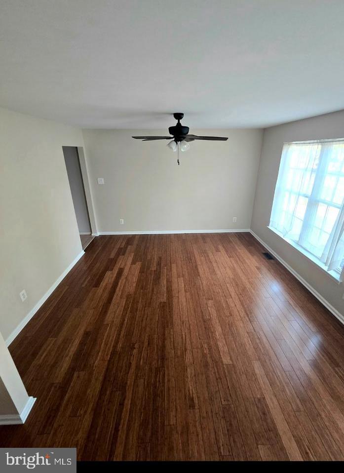 644 Surrey Road Sewell, NJ 08080 - Photo 19 of 37 wooden floor in an empty room with a window