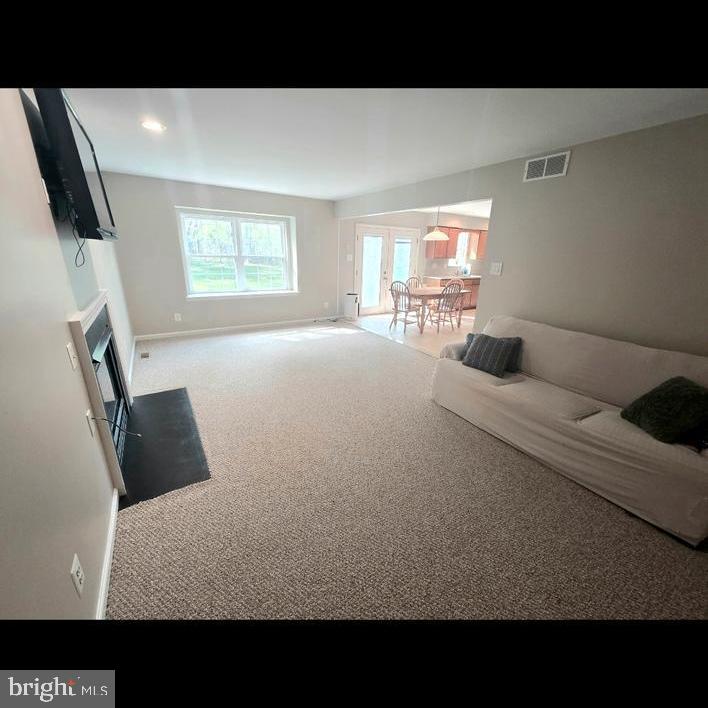 644 Surrey Road Sewell, NJ 08080 - Photo 21 of 37 a living room with furniture and a flat screen tv