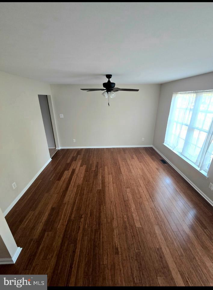 644 Surrey Road Sewell, NJ 08080 - Photo 35 of 37 wooden floor in an empty room with a window
