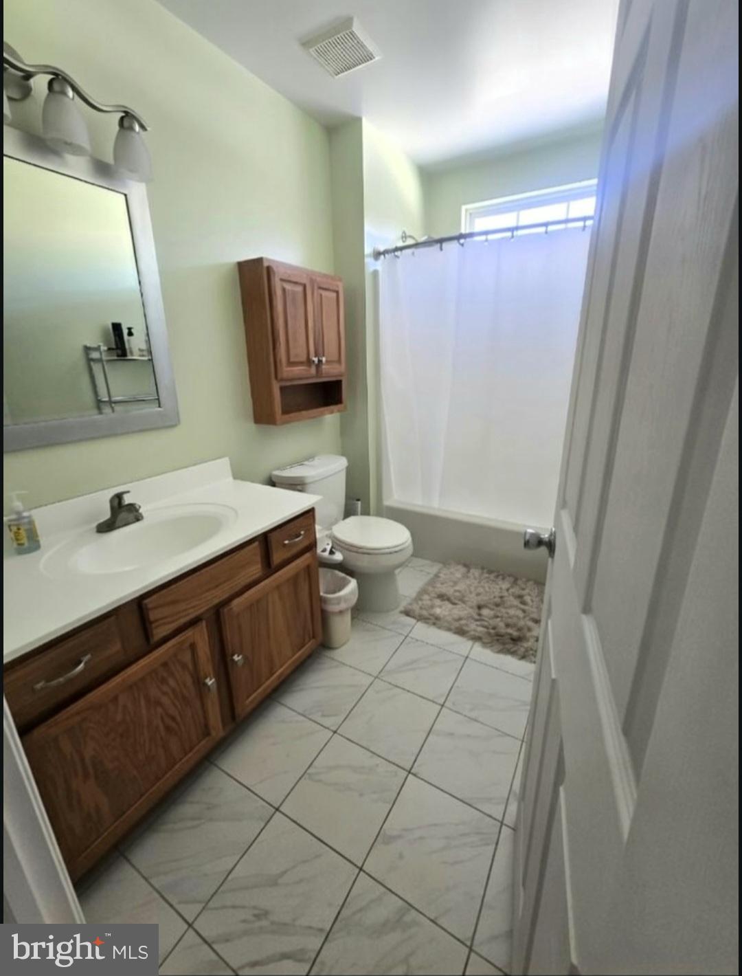 644 Surrey Road Sewell, NJ 08080 - Photo 7 of 37 a bathroom with a double vanity sink toilet and shower