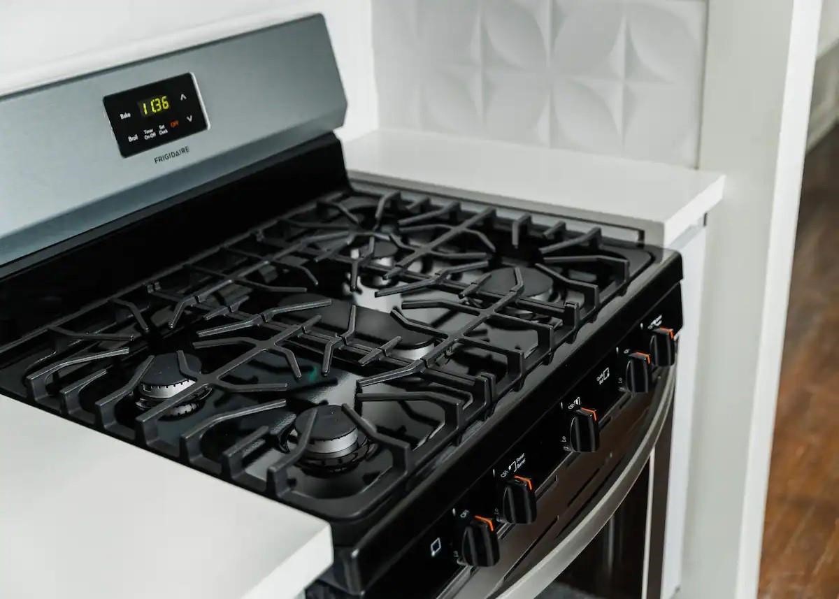 114 Redan Street Houston, TX 77009 - Photo 9 of 14 Gas range stove and oven.