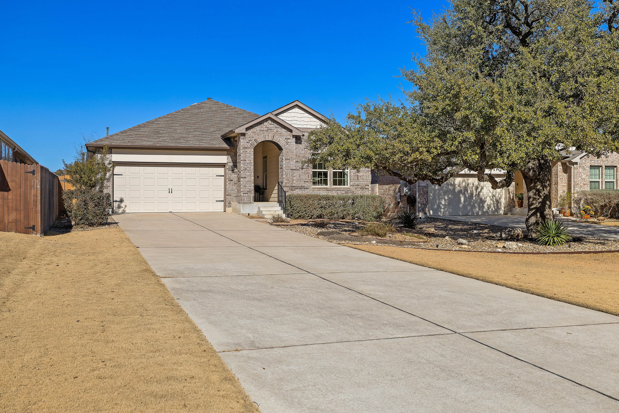 1836 Chickasaw Run Leander, TX 78641 - Photo 1 of 1 a view of a house with a yard