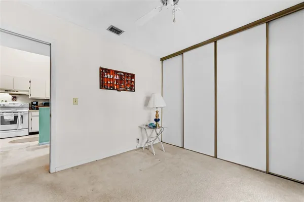 a view of an empty room with a window