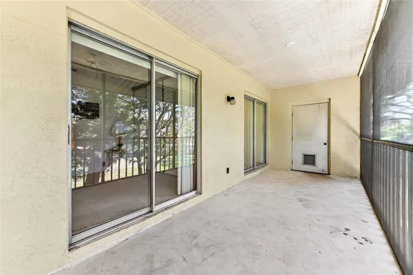 a view of a room with a large window