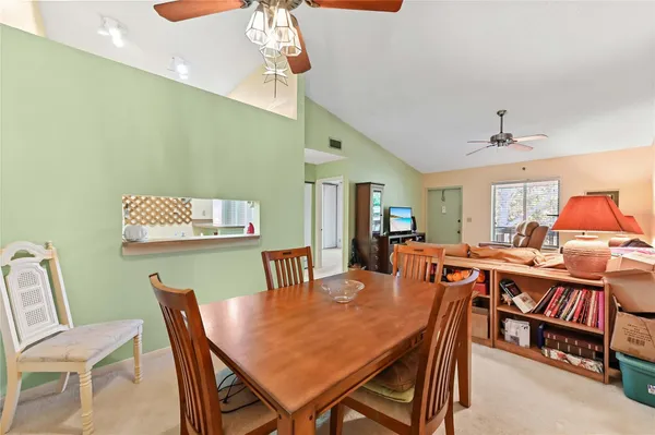 a view of a dining room with furniture