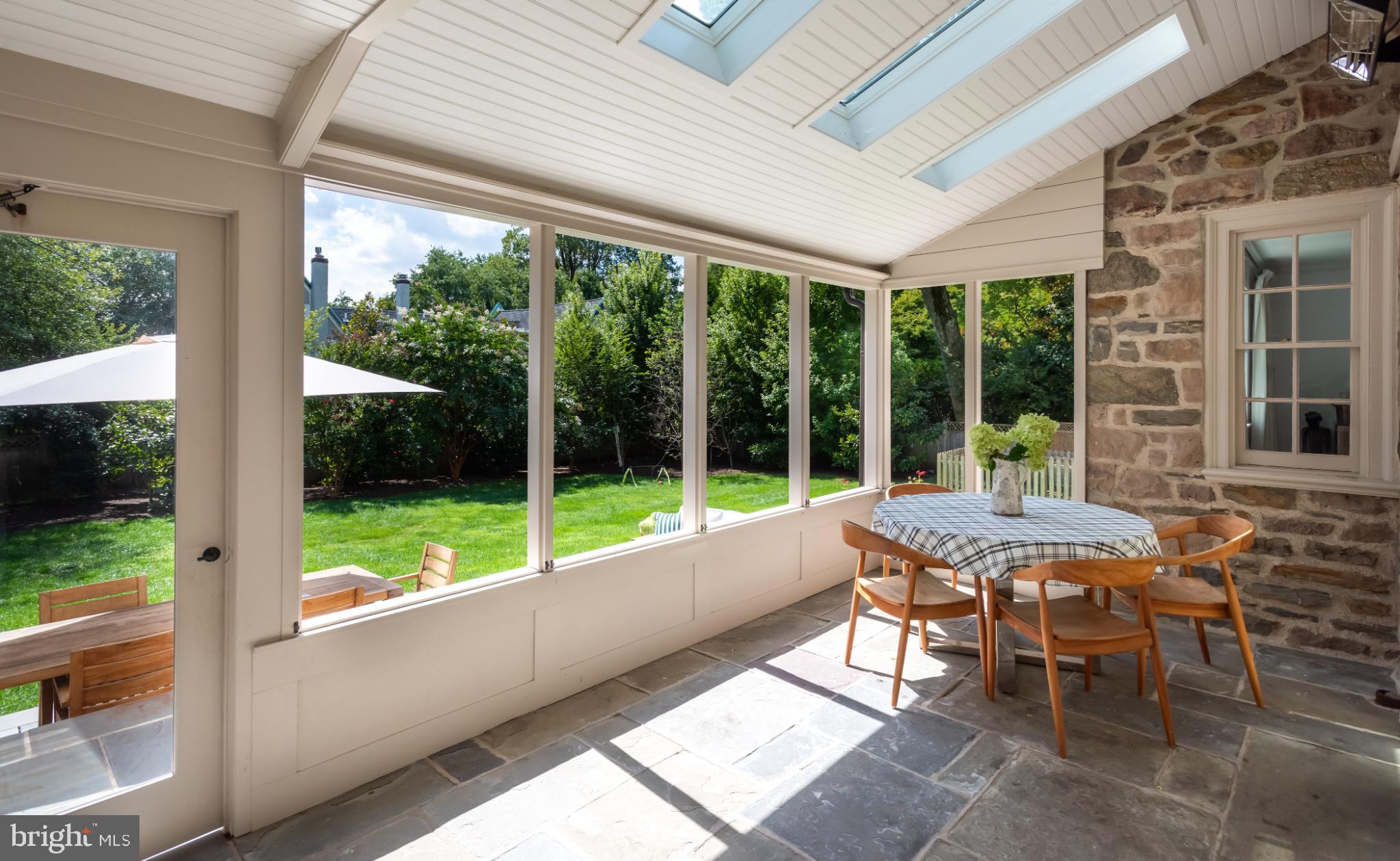315 Caversham Road Bryn Mawr, PA 19010 - Photo 18 of 55 Sunlit sunroom with garden views.