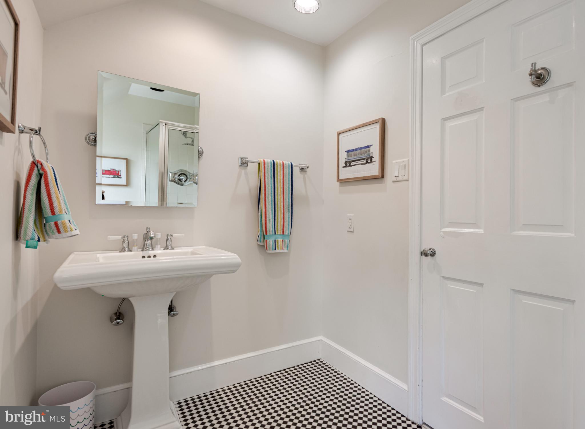 315 Caversham Road Bryn Mawr, PA 19010 - Photo 35 of 55 Chic bathroom with classic black and white tiles.