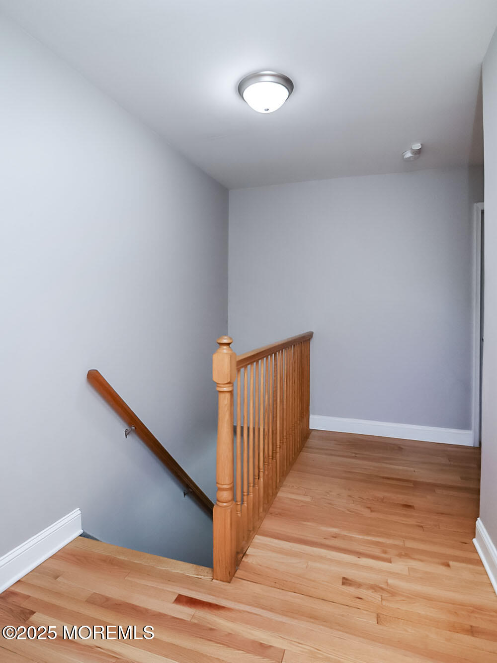 22 Abraham Drive Howell, NJ 07731 - Photo 15 of 24 a view of an empty room with wooden floor