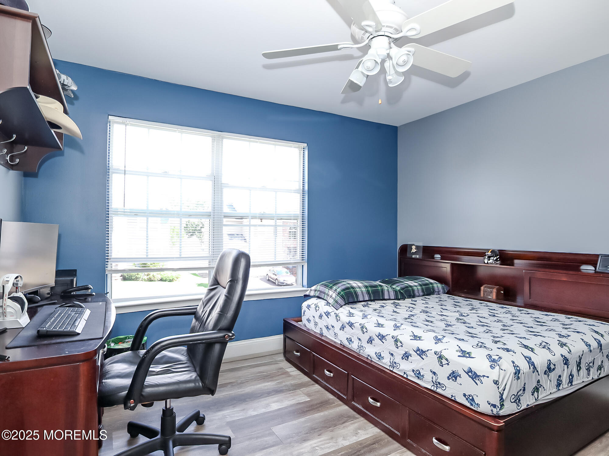 22 Abraham Drive Howell, NJ 07731 - Photo 19 of 24 a bedroom with a bed a desk and chair with window