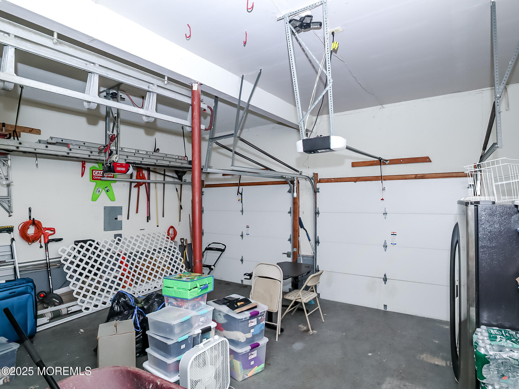 22 Abraham Drive Howell, NJ 07731 - Photo 23 of 24 a view of a storage room with washer and dryer