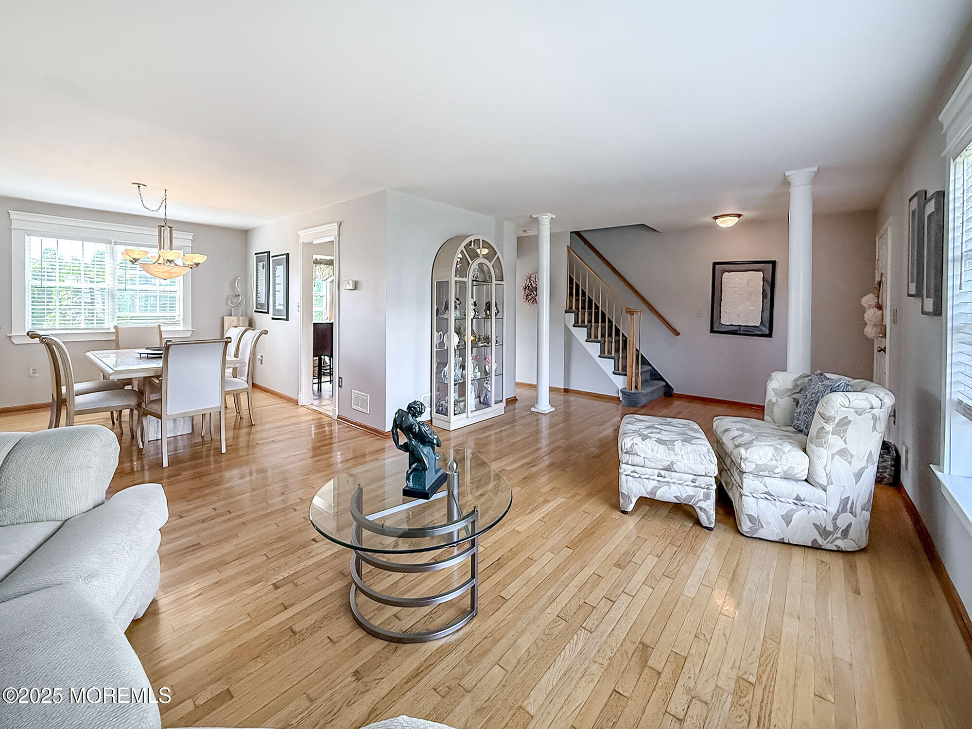 22 Abraham Drive Howell, NJ 07731 - Photo 7 of 24 a living room with furniture and wooden floor