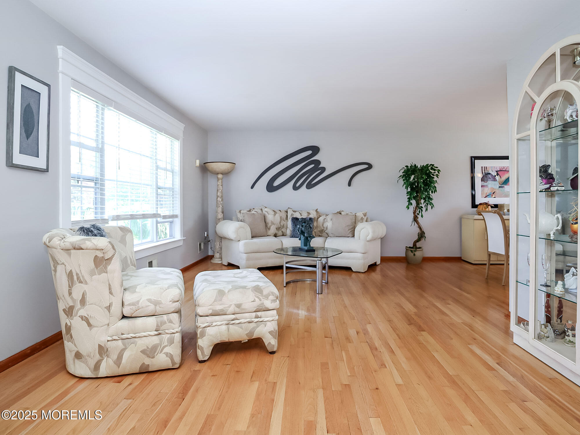 22 Abraham Drive Howell, NJ 07731 - Photo 8 of 24 a living room with furniture and a flat screen tv