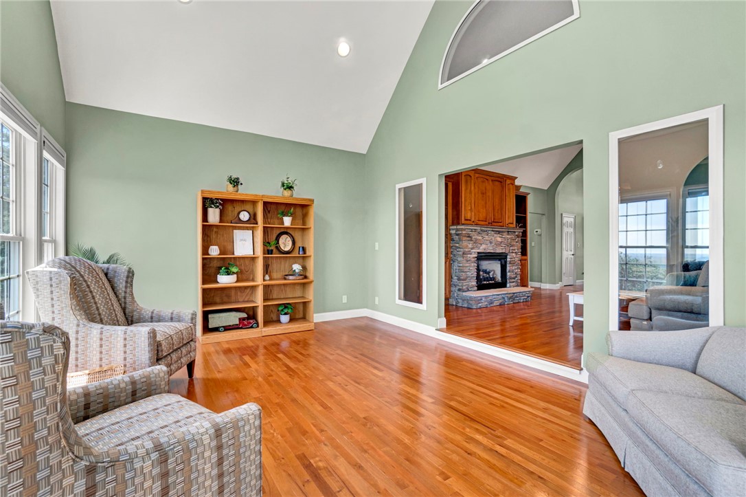603 Tamassee Ridge Way Salem, SC 29676 - Photo 13 of 46 This airy living space features soaring ceilings and polished wood floors, inviting comfortable gatherings.