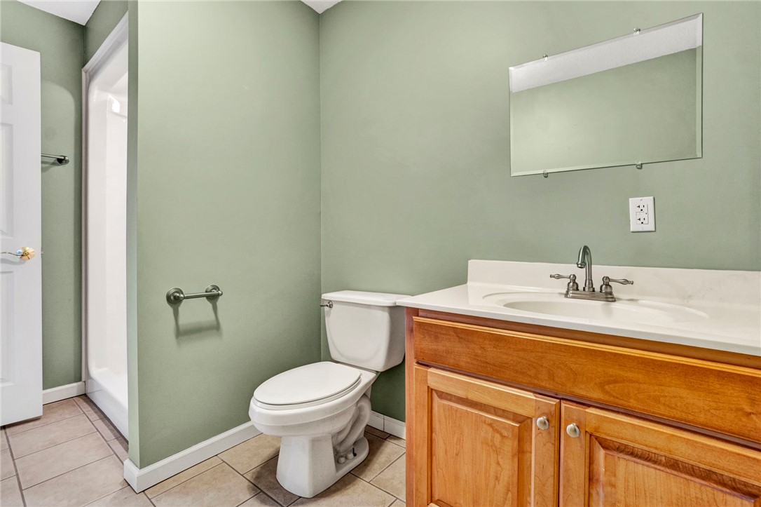 603 Tamassee Ridge Way Salem, SC 29676 - Photo 27 of 46 This bathroom features a contemporary vanity and shower, creating a fresh and inviting ambiance.