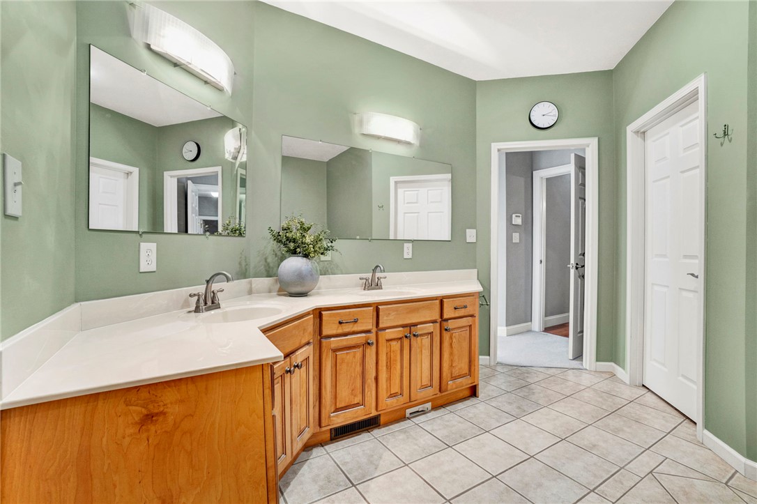 603 Tamassee Ridge Way Salem, SC 29676 - Photo 31 of 46 This spacious bathroom offers a large double vanity with ample storage and tiled flooring.