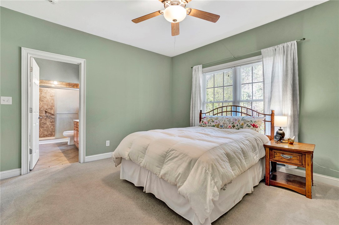 603 Tamassee Ridge Way Salem, SC 29676 - Photo 33 of 46 This cozy bedroom features soft tones and natural light, creating a serene and inviting atmosphere.