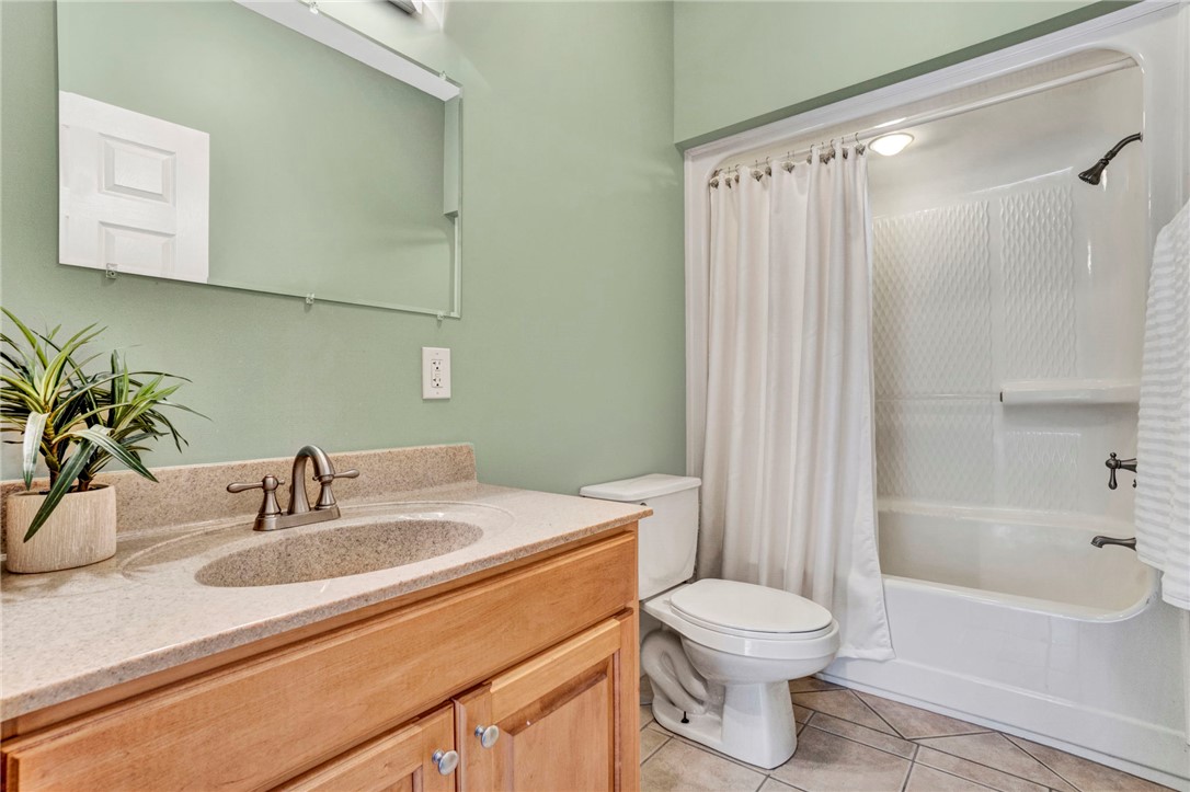 603 Tamassee Ridge Way Salem, SC 29676 - Photo 36 of 46 This bathroom features a contemporary vanity, a clean toilet, and a practical shower-tub combination.