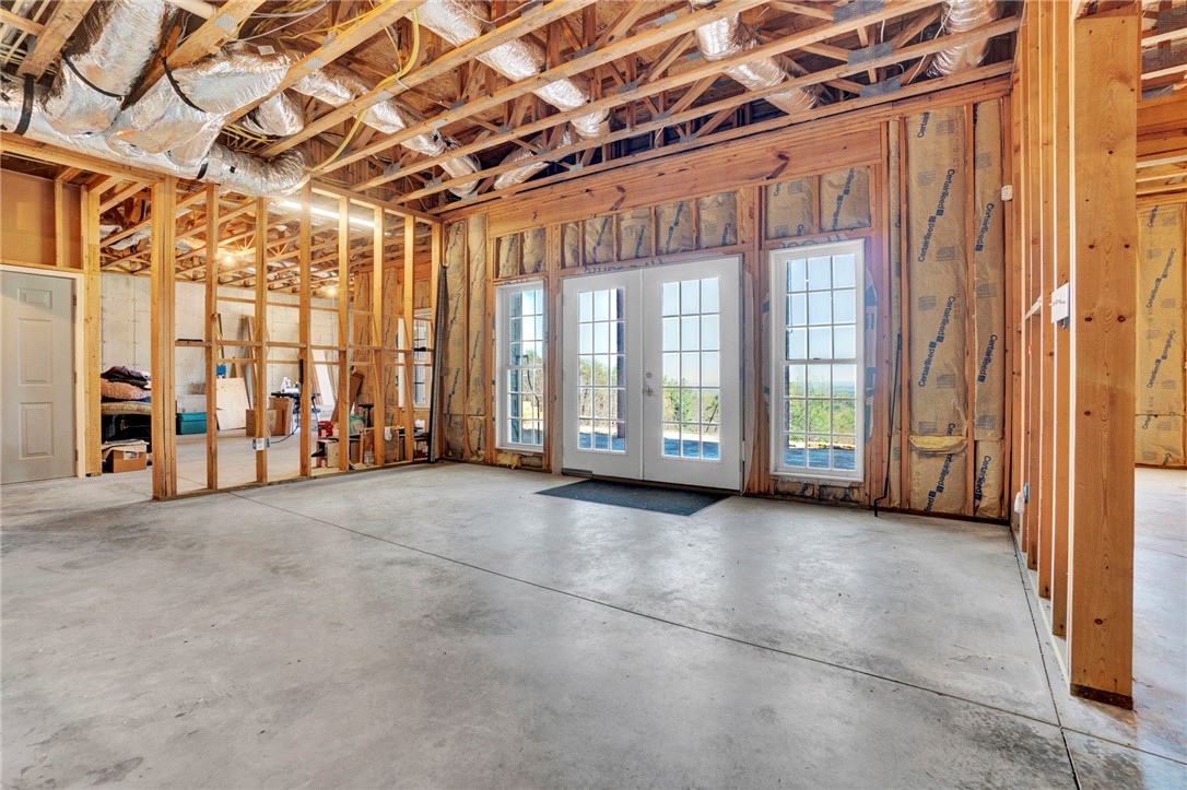 603 Tamassee Ridge Way Salem, SC 29676 - Photo 39 of 46 Unfinished interior space offers a blank canvas with concrete flooring and ample natural light.
