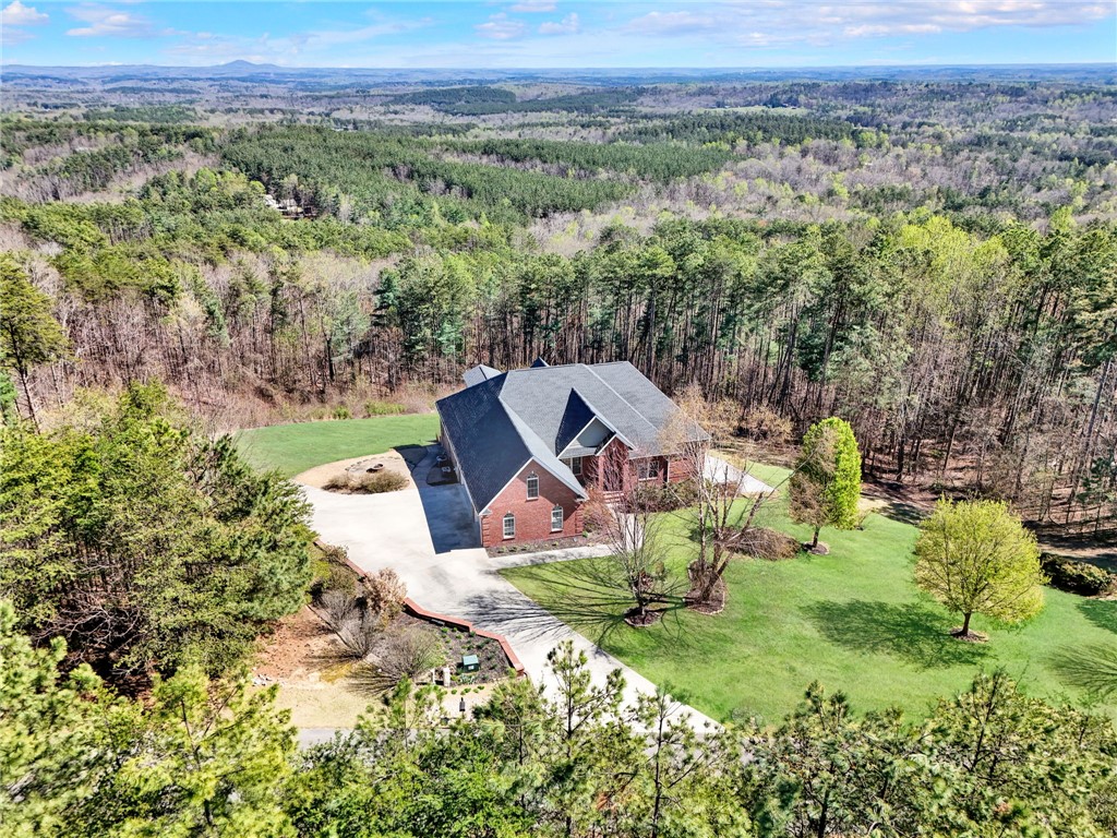 603 Tamassee Ridge Way Salem, SC 29676 - Photo 42 of 46 Nestled among rolling hills, this property offers serene living with expansive natural surroundings.