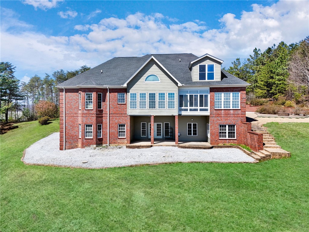 603 Tamassee Ridge Way Salem, SC 29676 - Photo 46 of 46 This grand residence showcases a charming facade and a spacious, verdant yard.