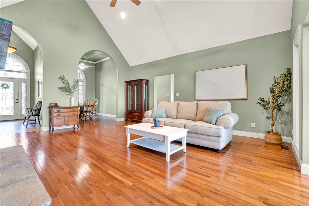 603 Tamassee Ridge Way Salem, SC 29676 - Photo 10 of 46 This expansive living area features lustrous wood flooring and soaring vaulted ceilings, perfect for comfortable gatherings.