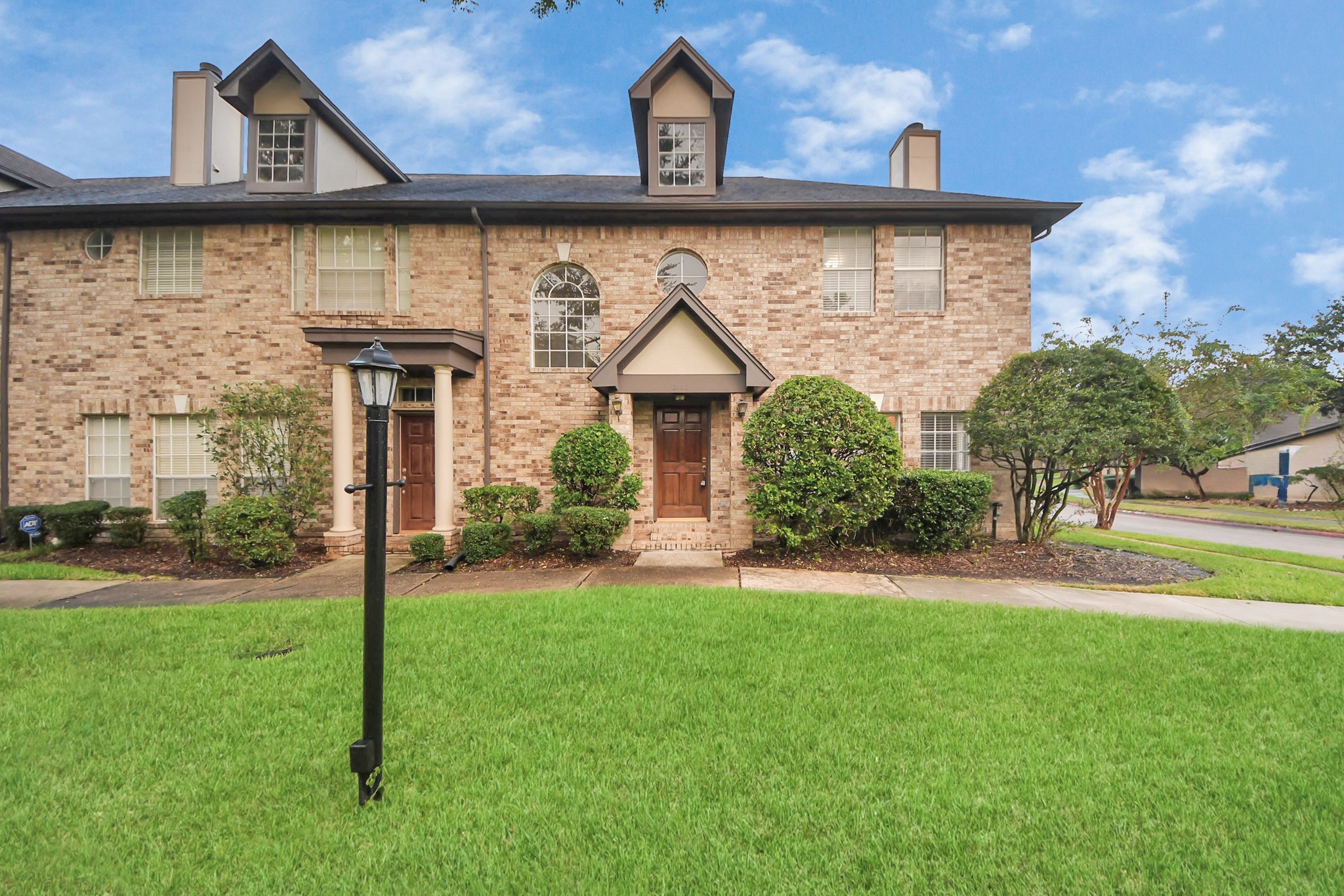 2102 Gemini Avenue Houston, TX 77058 - Photo 1 of 40 a front view of a house with a yard and garage