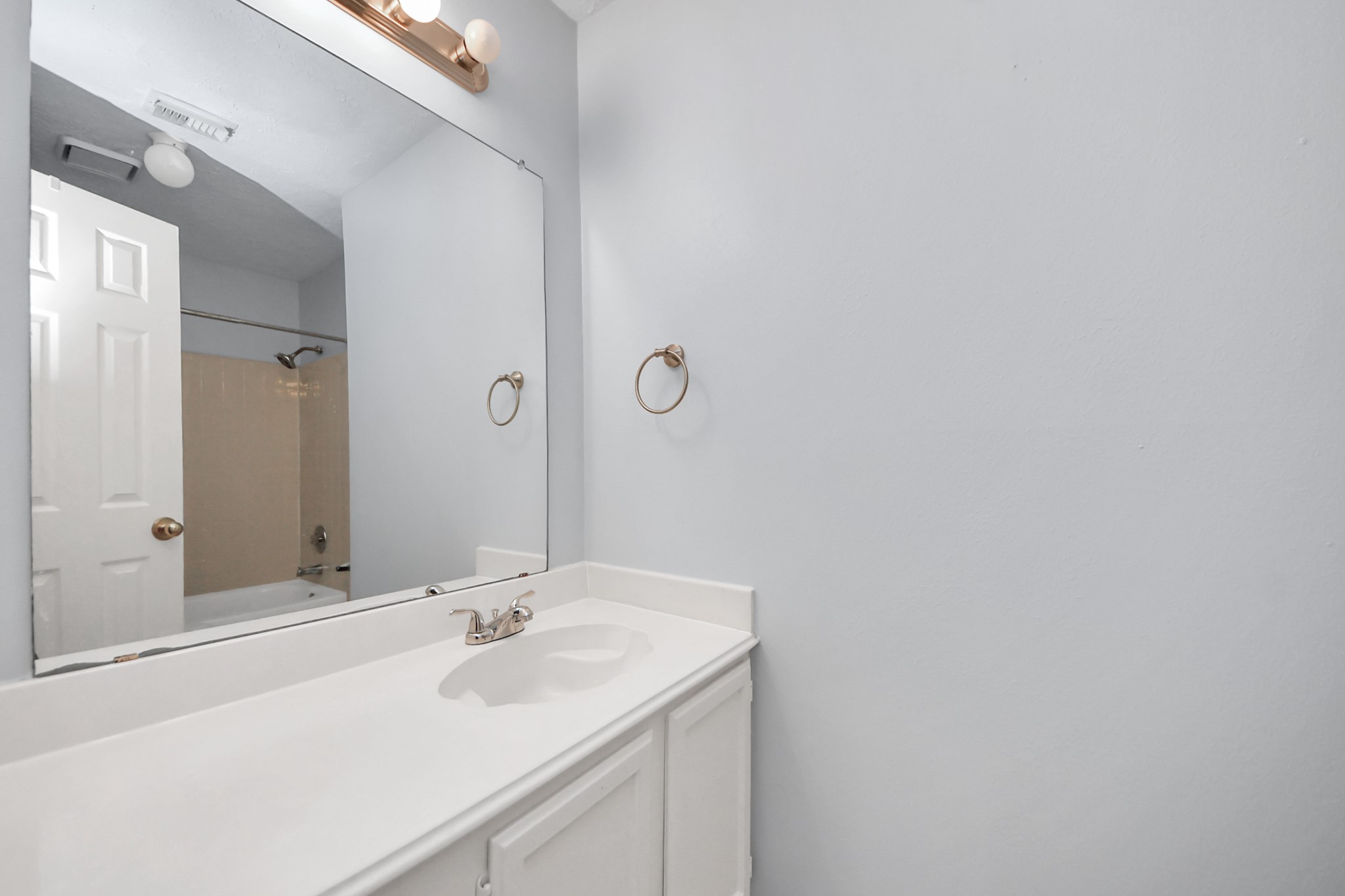 2102 Gemini Avenue Houston, TX 77058 - Photo 17 of 40 a bathroom with a sink and a mirror