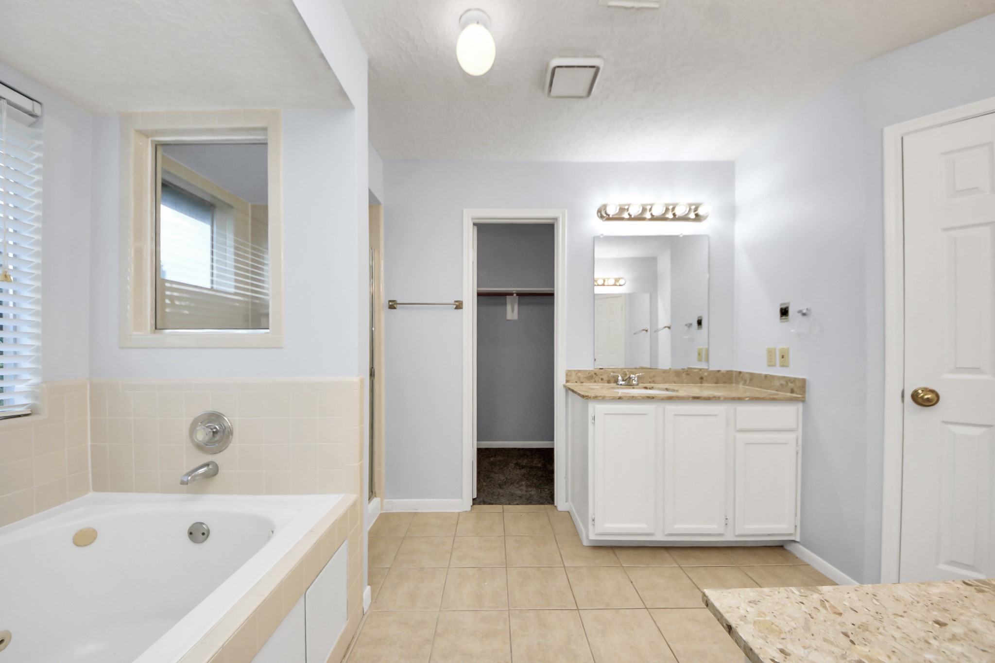 2102 Gemini Avenue Houston, TX 77058 - Photo 26 of 40 a bathroom with a bathtub sink and toilet