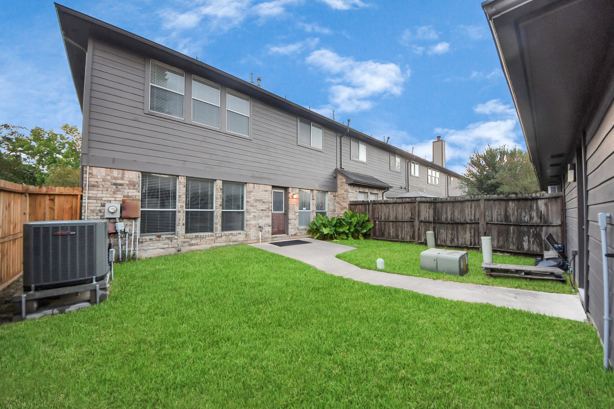 2102 Gemini Avenue Houston, TX 77058 - Photo 32 of 40 a view of house with backyard and a slide