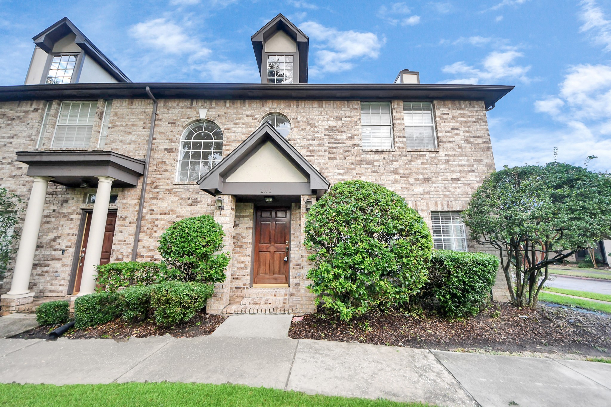 2102 Gemini Avenue Houston, TX 77058 - Photo 36 of 40 a front view of a house with garden