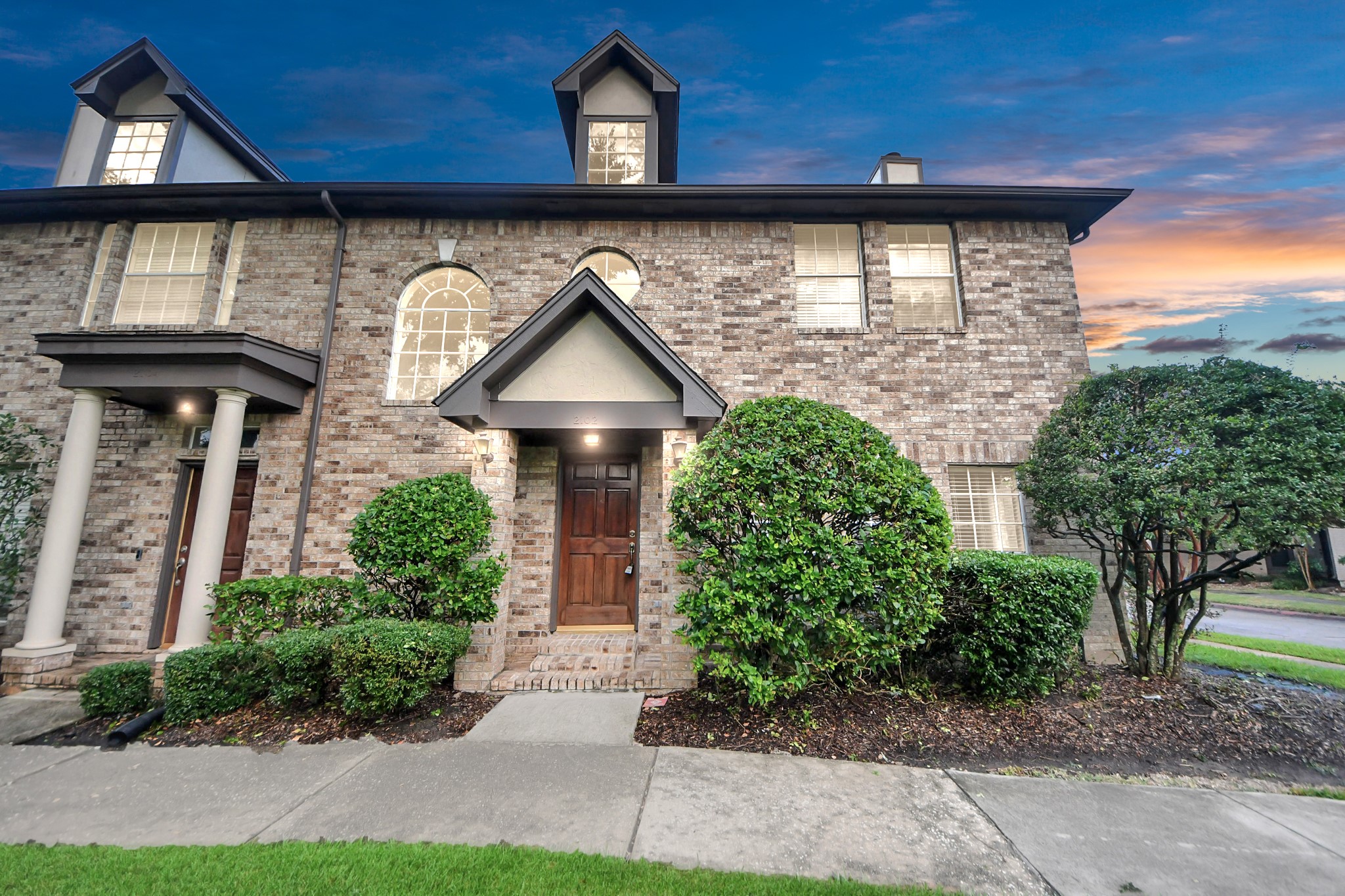 2102 Gemini Avenue Houston, TX 77058 - Photo 37 of 40 a front view of a house with garden