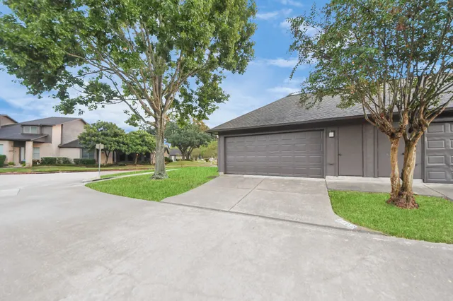a view of outdoor space yard and garage