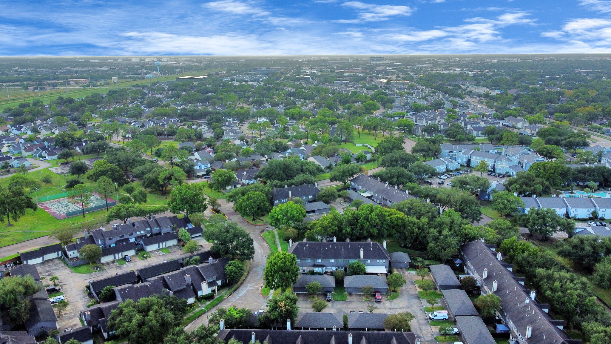 2102 Gemini Avenue Houston, TX 77058 - Photo 39 of 40 an aerial view of residential houses with outdoor space and trees