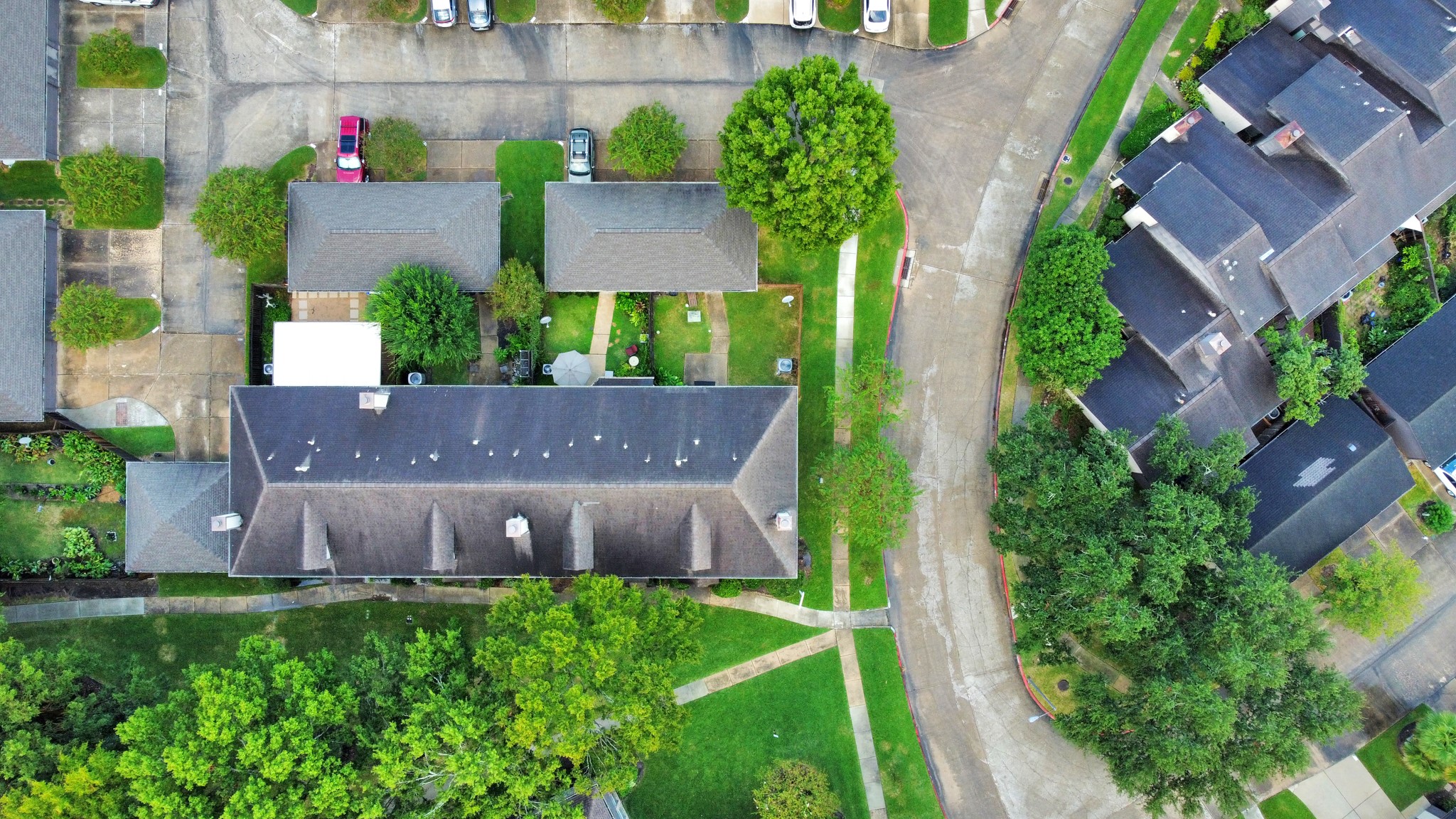 2102 Gemini Avenue Houston, TX 77058 - Photo 40 of 40 an aerial view of a house and a yard and tennis court